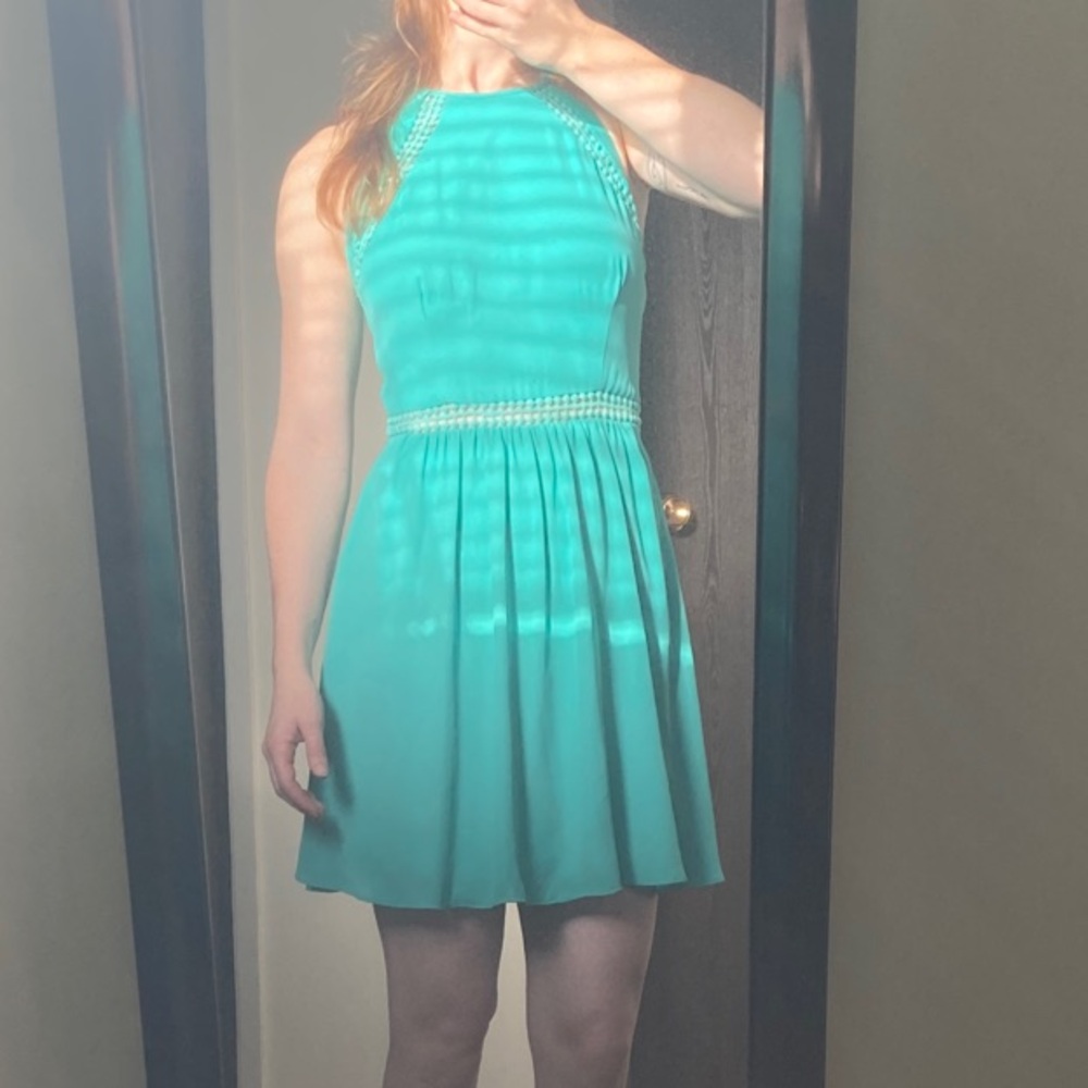 B. Smart Teal Sleeveless Mini Dress